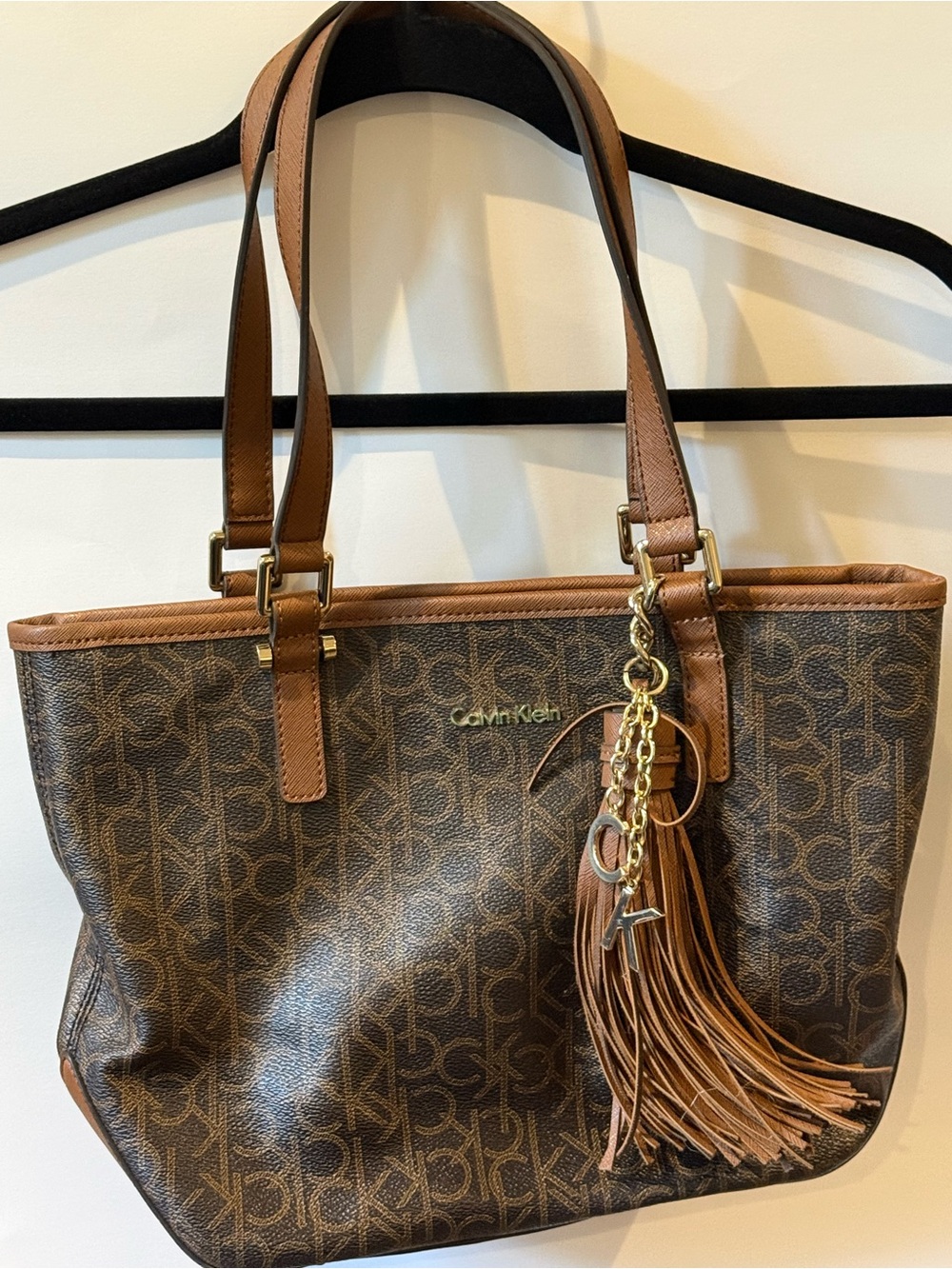 Calvin Klein Brown Monogram Tote with Tassel Charm